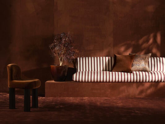 Standing at attention, Rolano salutes to a classic military braid,  its horizontal chenille stripe appearing to be sewn on top of a blended ground, giving it a three-dimensional appearance and temptingly tactile quality